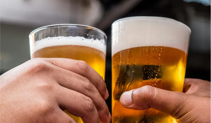 Celebrating by having beer